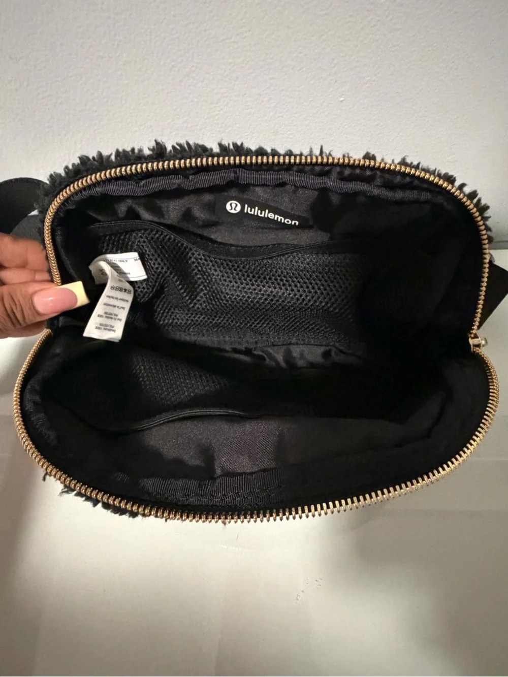 lululemon athletica Black Faux Shearling Belt Bag with Gold Accent